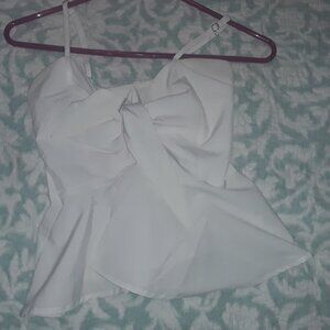 Spaghetti straps, white front tie closure white halter top.  (No Brand Name)